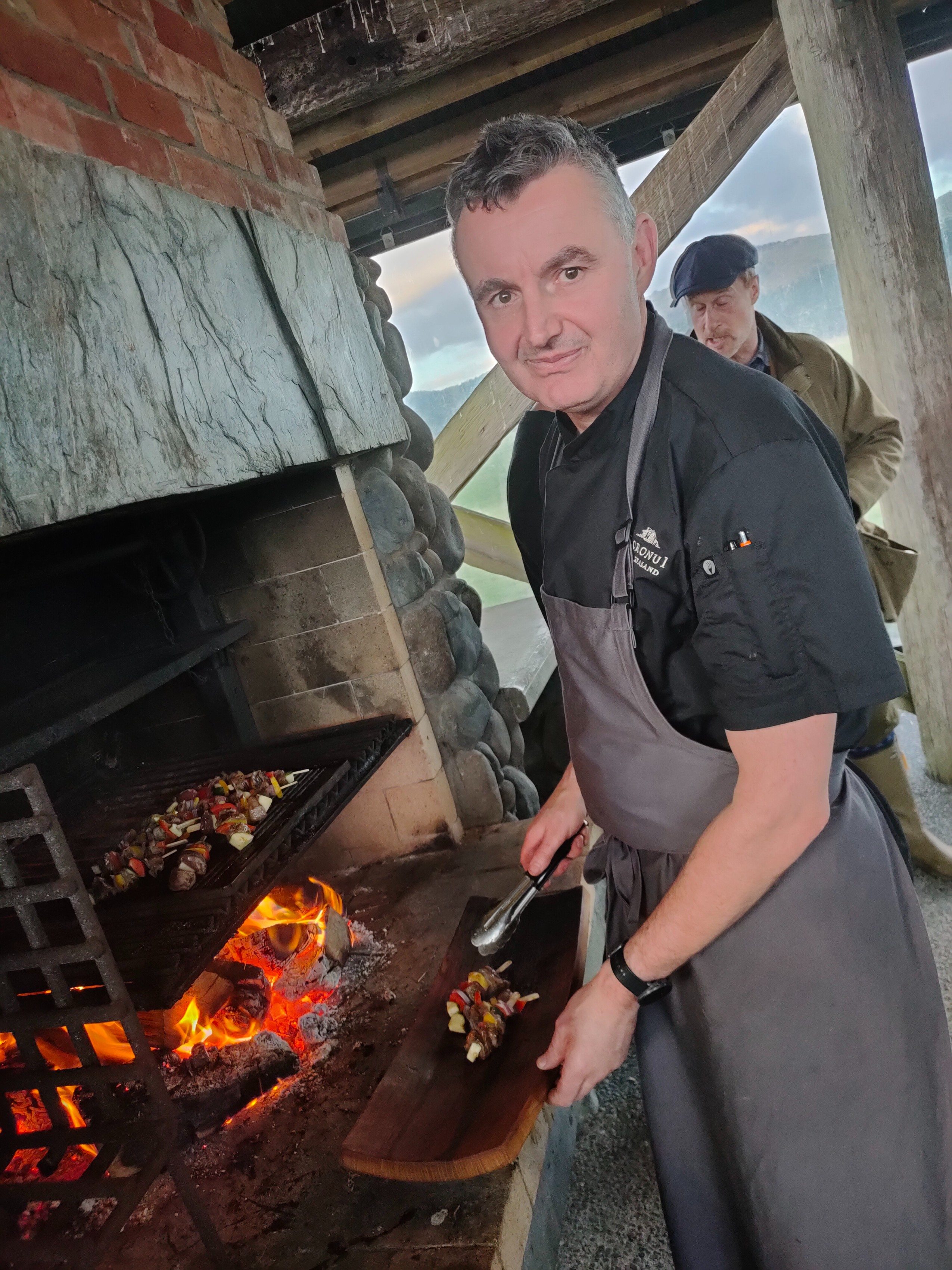 Head Chef, Adrian Walker cooking venison kebab